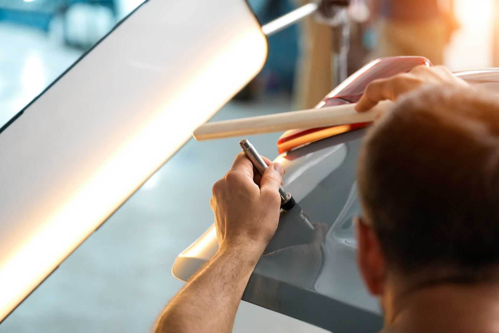 how much paintless dent repair cost